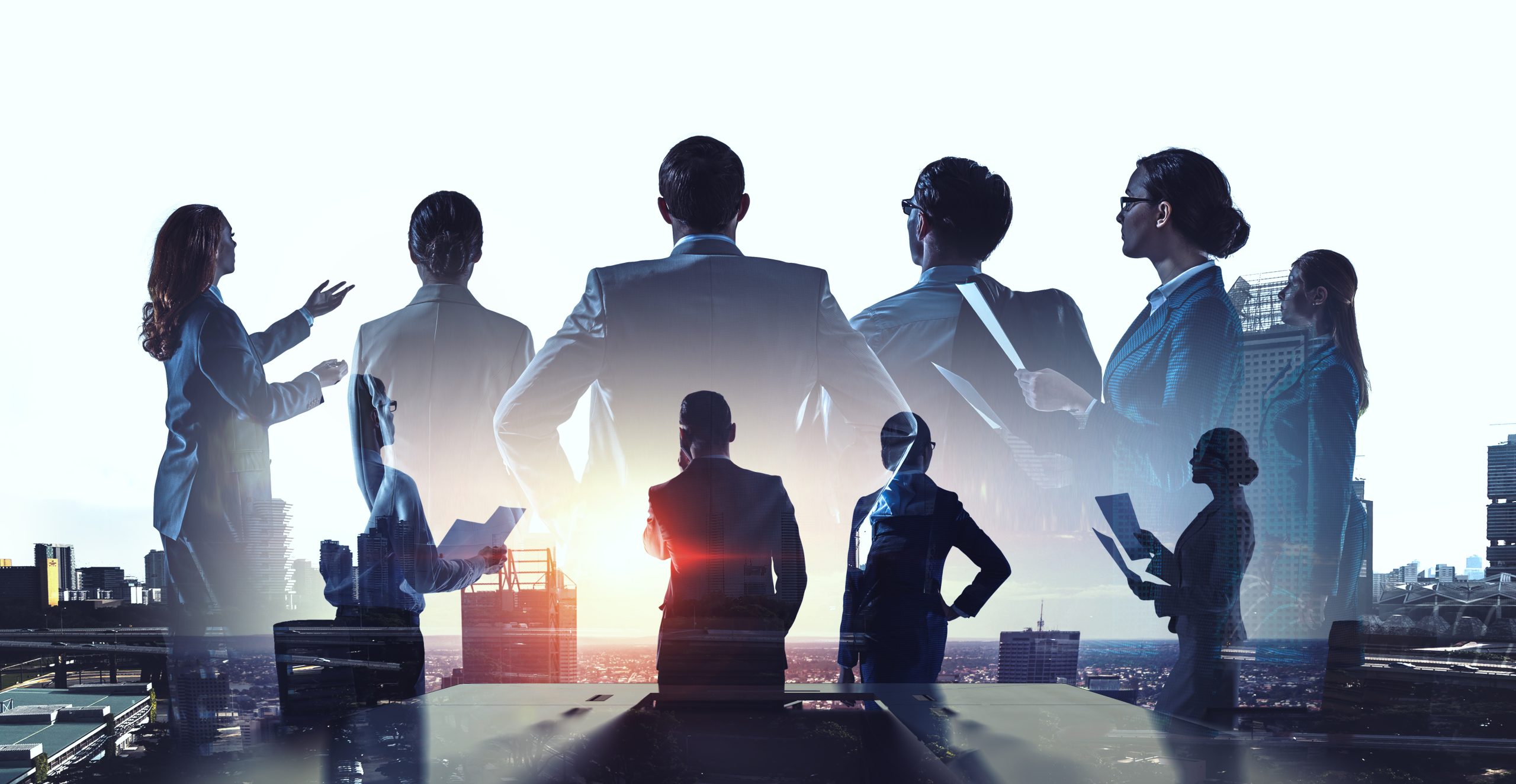 Group Of Business People Outlines With Lit Background